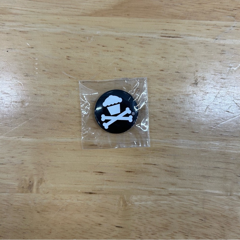 Johnny Cupcakes Pin Crossbones Pinback Button Cupcake Black White NEW Sealed